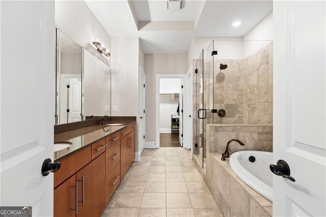 bathroom with vanity, tile patterned floors, and independent shower and bath