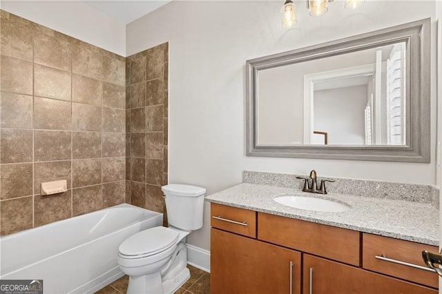 full bathroom featuring tile patterned floors, vanity, toilet, and tiled shower / bath