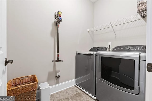 laundry room with washer and dryer