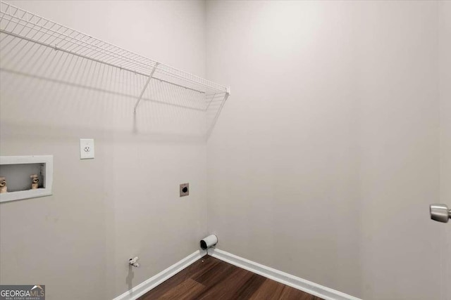 clothes washing area featuring gas dryer hookup, washer hookup, dark hardwood / wood-style floors, and hookup for an electric dryer