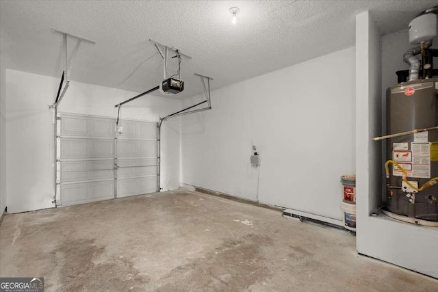 garage featuring gas water heater and a garage door opener