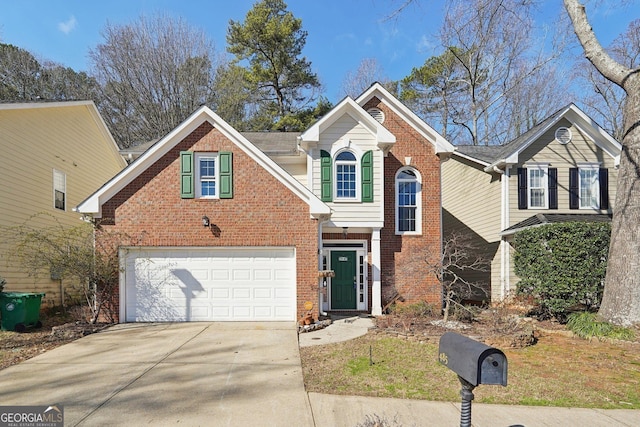 traditional-style home featuring driveway, brick siding, and an attached garage