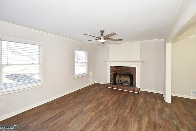 unfurnished living room with dark hardwood / wood-style flooring, ceiling fan, a fireplace, and ornamental molding