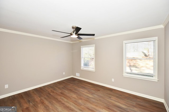 unfurnished room with dark hardwood / wood-style floors, ceiling fan, and crown molding