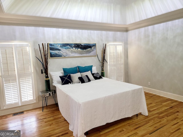 bedroom featuring hardwood / wood-style flooring