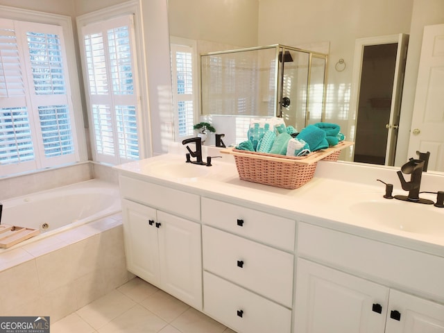 bathroom with vanity, tile patterned floors, a wealth of natural light, and independent shower and bath