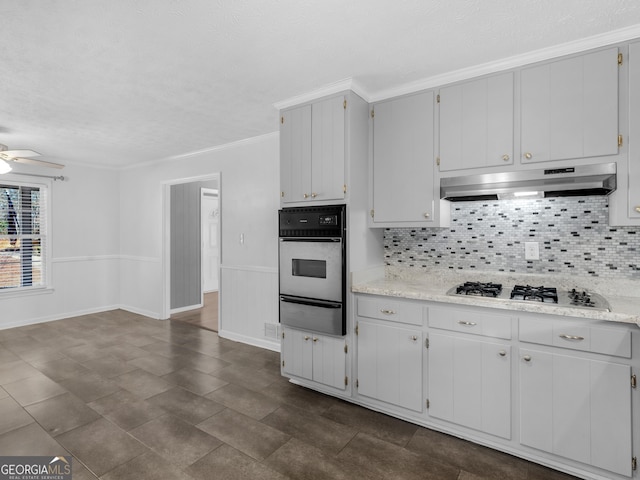 kitchen with stainless steel oven, crown molding, gas stovetop, decorative backsplash, and white cabinets