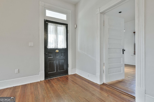 foyer entrance featuring hardwood / wood-style floors