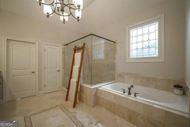 bathroom with plus walk in shower and a chandelier