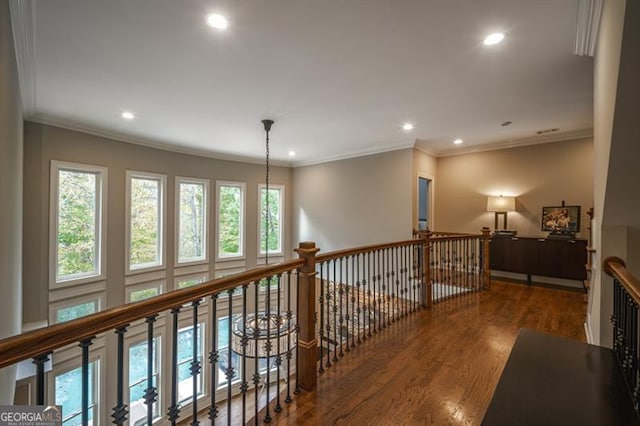 hall featuring crown molding and wood-type flooring