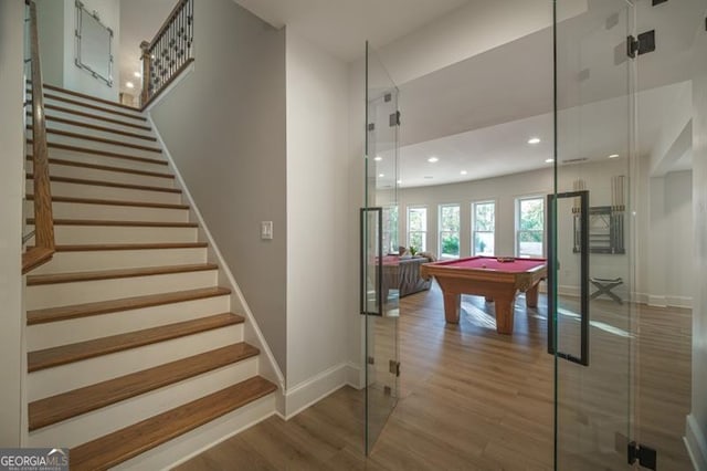 recreation room with wood-type flooring and billiards