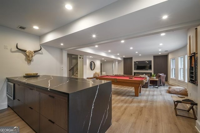 game room featuring billiards and light hardwood / wood-style flooring