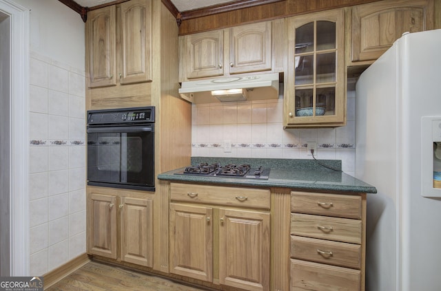 kitchen featuring backsplash, stainless steel gas cooktop, light hardwood / wood-style flooring, oven, and white fridge with ice dispenser