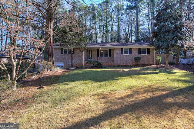 single story home featuring a front yard