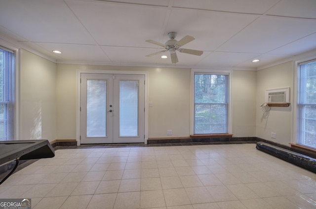 entryway featuring french doors, ceiling fan, an AC wall unit, plenty of natural light, and pool table