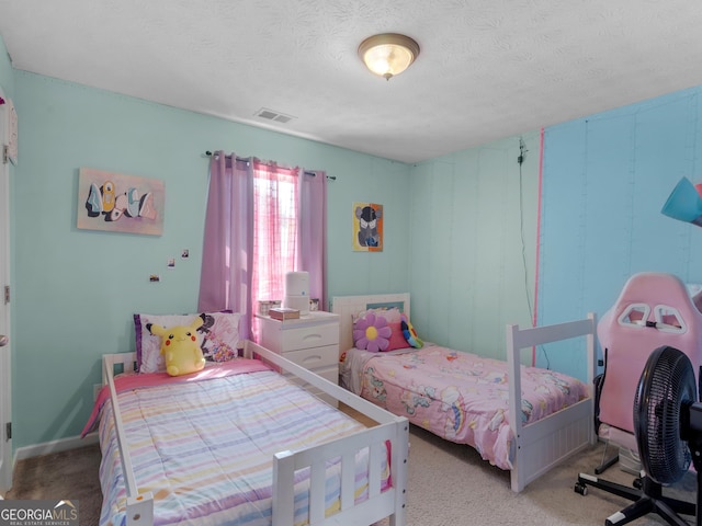 bedroom featuring a textured ceiling