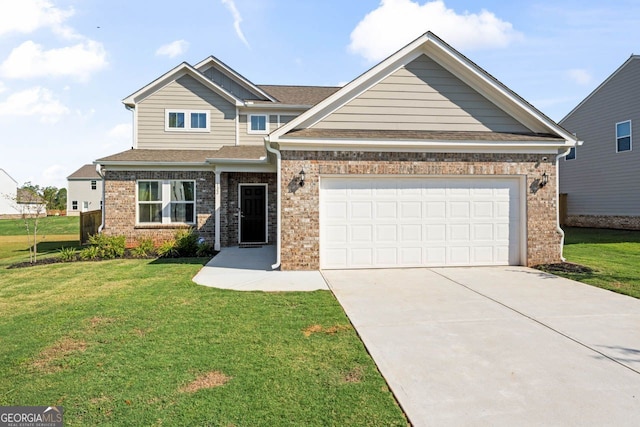 craftsman house featuring a garage and a front yard