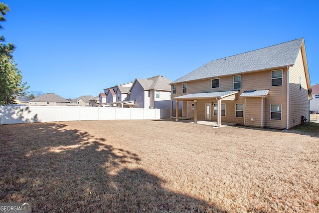 back of property with a patio area