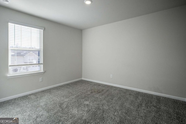 view of carpeted spare room