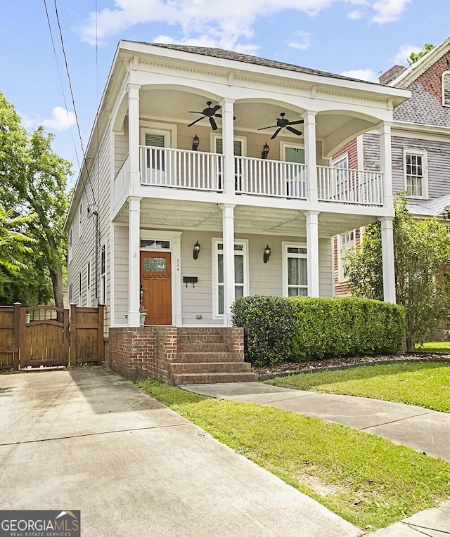 view of front of property with a balcony