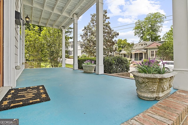 view of pool with covered porch