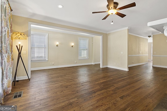 unfurnished living room featuring ceiling fan, dark hardwood / wood-style flooring, and crown molding