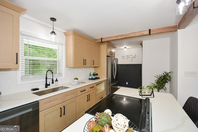 kitchen with decorative backsplash, stainless steel appliances, sink, pendant lighting, and light brown cabinets