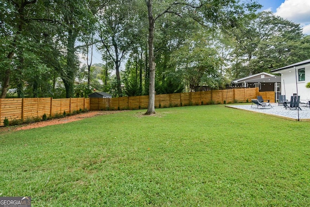 view of yard featuring a patio