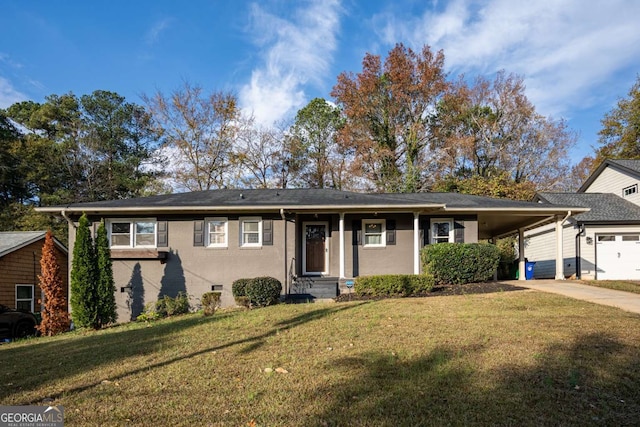 ranch-style home featuring a front yard and a carport