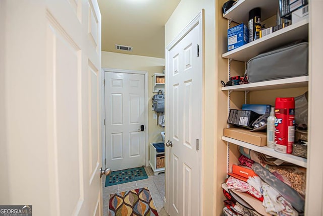 interior space featuring light tile patterned flooring