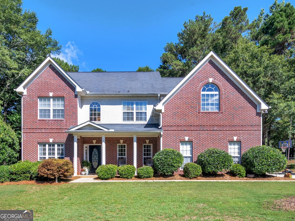 view of property with a front yard