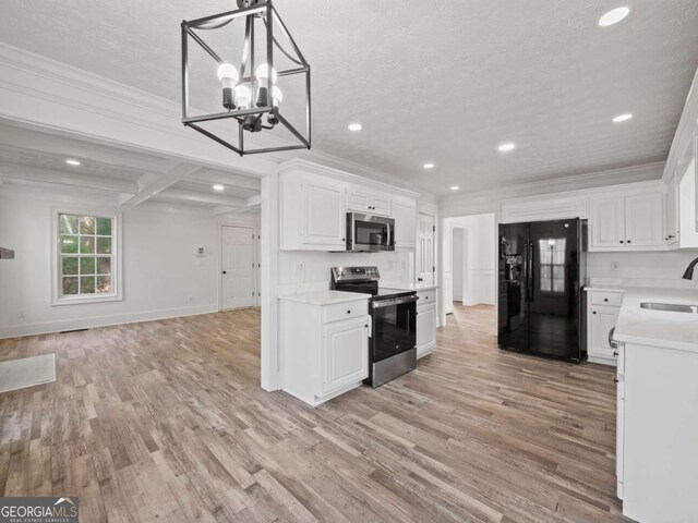 kitchen featuring coffered ceiling, stainless steel appliances, sink, beam ceiling, and white cabinets