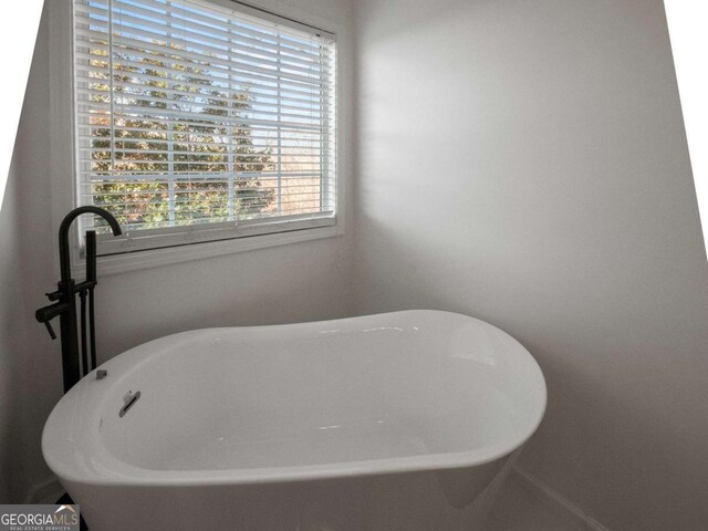 bathroom featuring a bathing tub