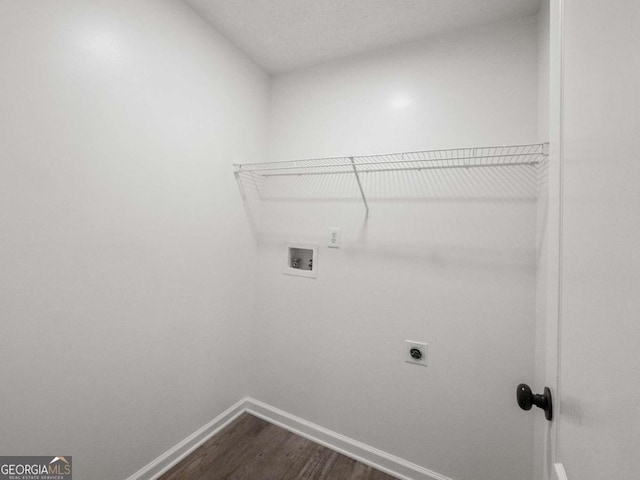 laundry room with hookup for an electric dryer, dark hardwood / wood-style flooring, and hookup for a washing machine