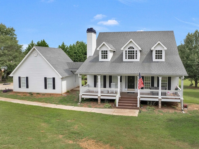 cape cod house featuring covered porch and a front lawn