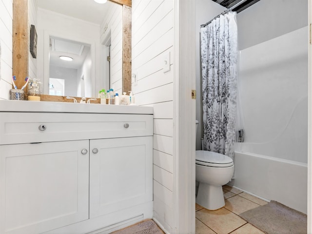 full bathroom with vanity, tile patterned floors, shower / bath combination with curtain, wooden walls, and toilet