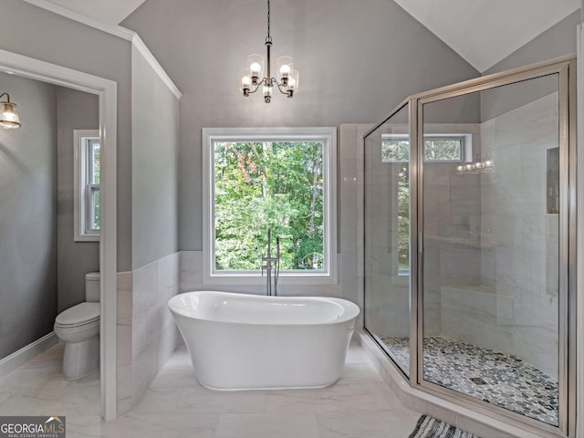 bathroom featuring toilet, an inviting chandelier, a wealth of natural light, and lofted ceiling