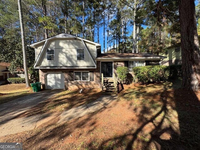 split level home with a garage