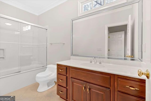 full bathroom featuring tile patterned floors, bath / shower combo with glass door, vanity, crown molding, and toilet