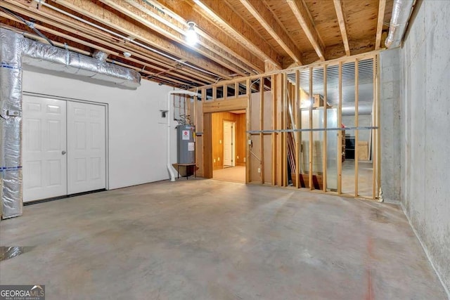 basement featuring electric water heater