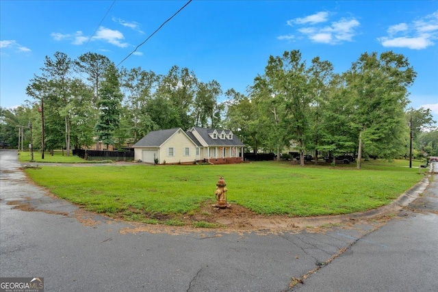 view of property exterior with a yard