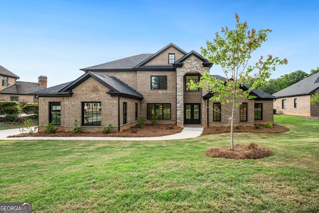 view of front of home featuring a front yard