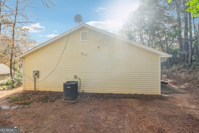 view of home's exterior featuring central AC