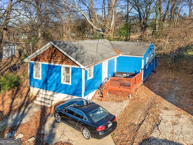 view of front of house featuring a wooden deck