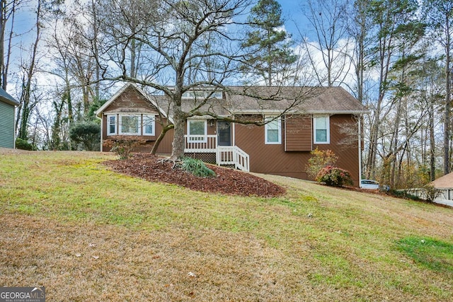 ranch-style home with a front yard