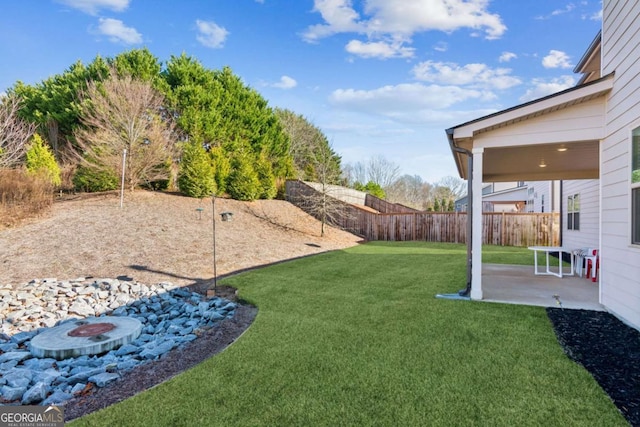 view of yard with a patio area