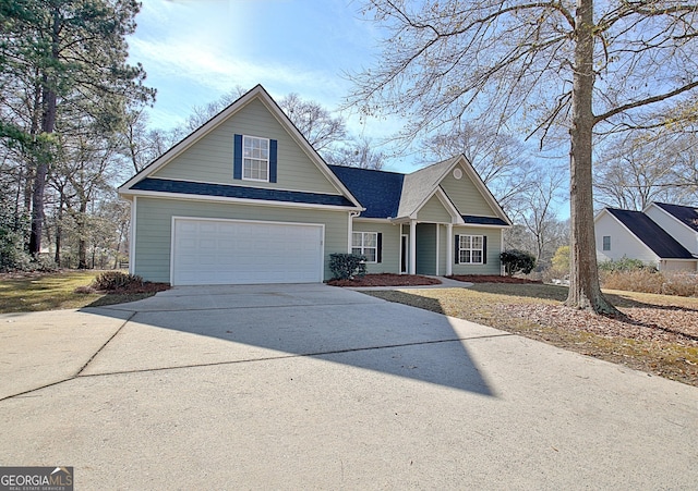 front of property with a garage