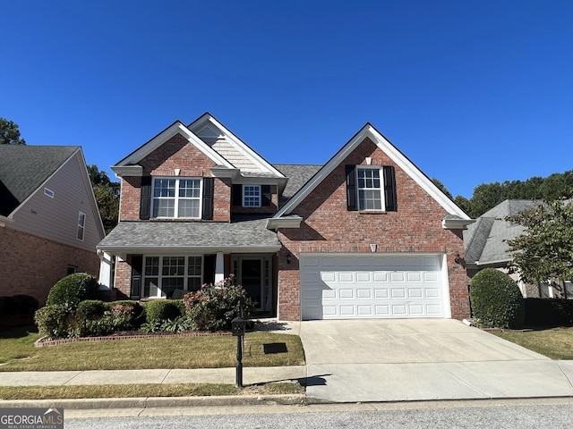 front of property with a garage