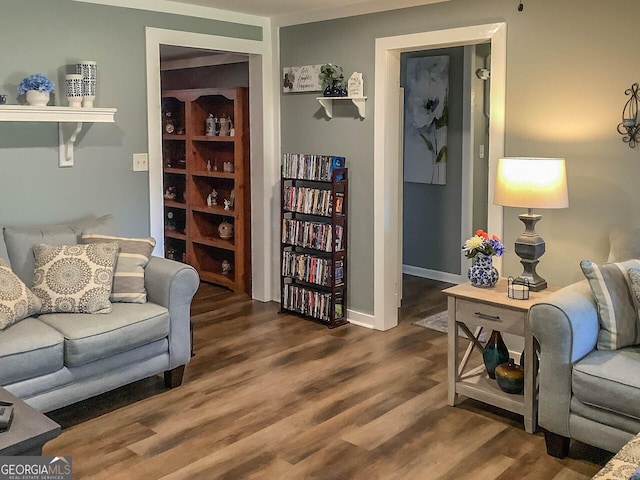 living room with dark hardwood / wood-style floors