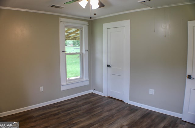 1812 Barnesville Hwy, Thomaston, GA 30286 - unfurnished room with attic access, healthy amount of natural light, dark wood-style flooring, and ornamental molding